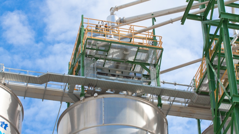 Polyethylene storage tanks at a chemical plant.